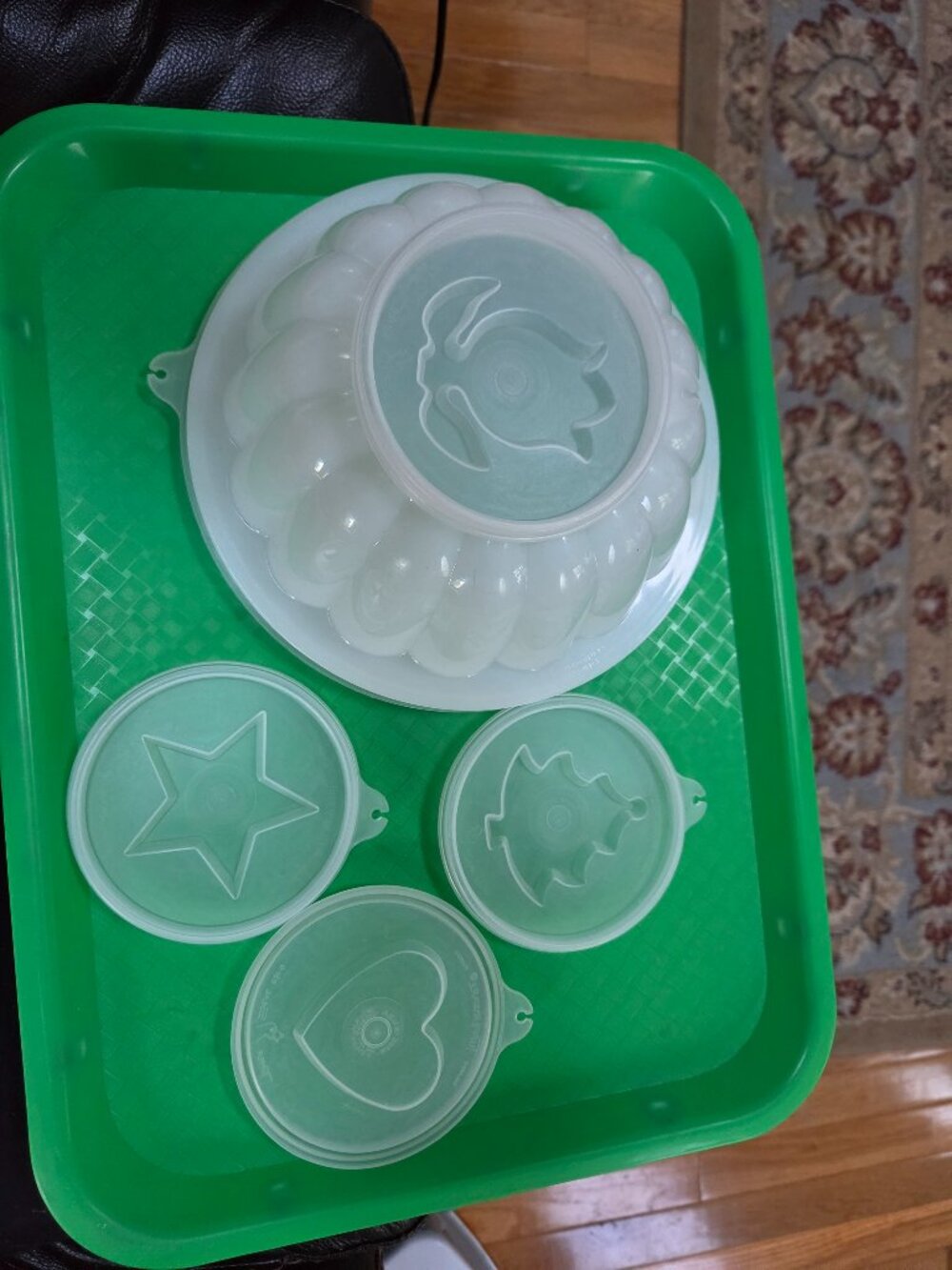 vintage Tupperware mold with four interchangeable lids